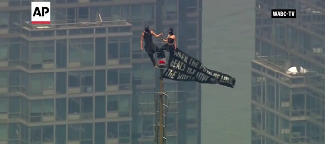 Batman Proposes to Catwoman during Empire State Building Climb